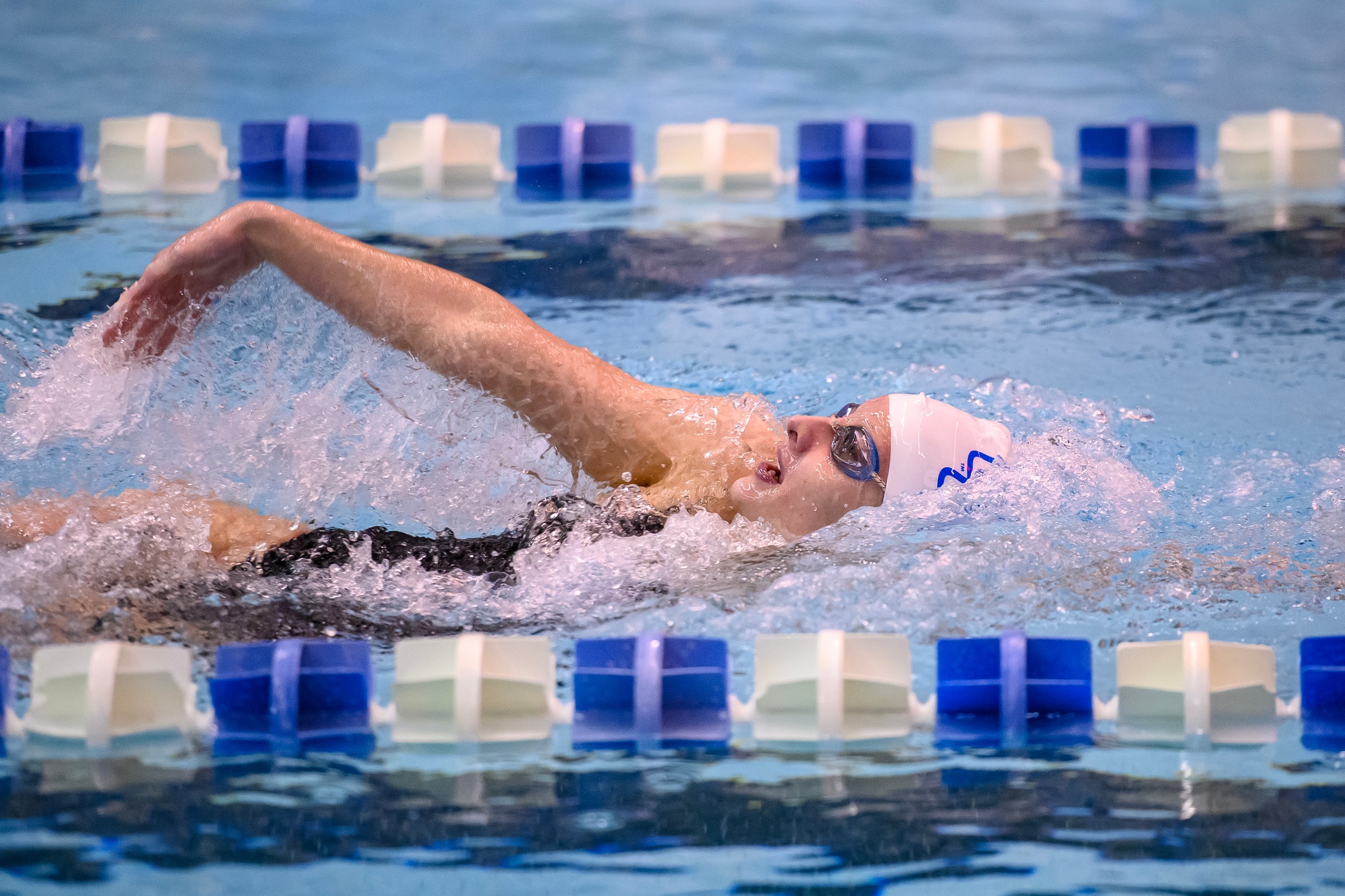 Katrine O'Leary won twice, including the 100-backstroke, on Saturday, January 18, 2025 on the first day of a two-day dual meet with SHU (Photo: Steve McLaughlin)